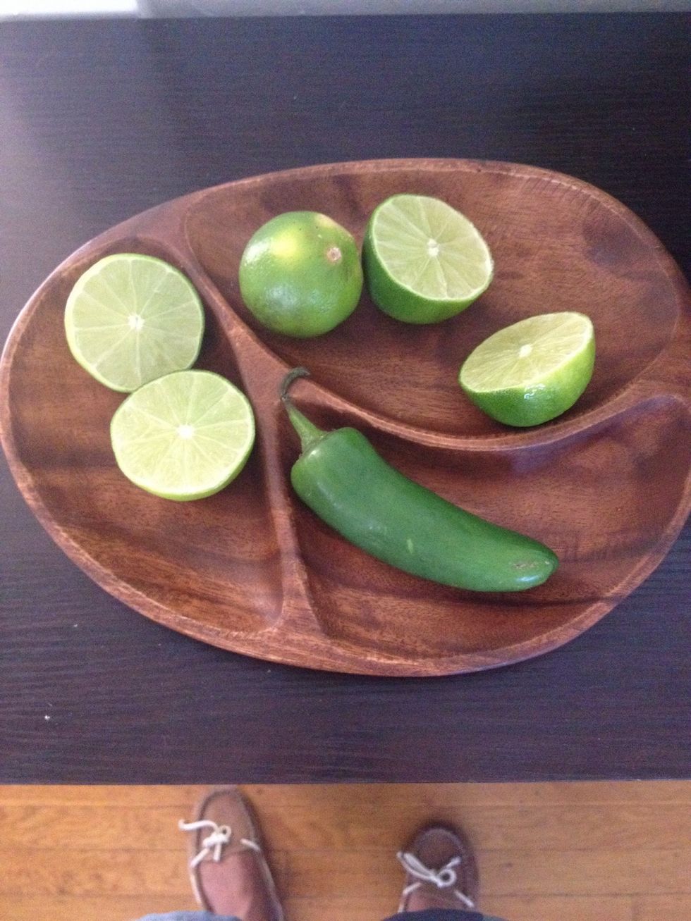 Cut the limes into halves and slice the jalape\u00f1o
