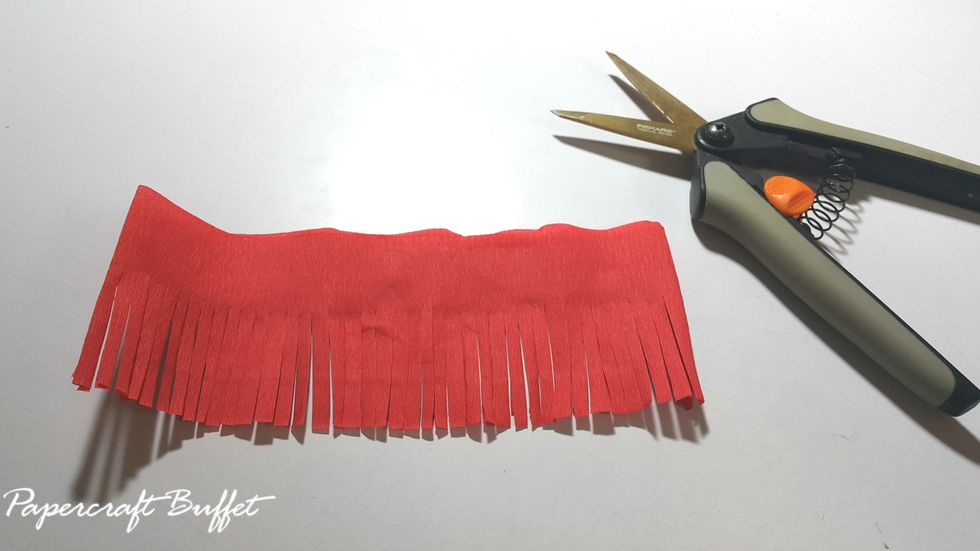 Cut the lower part of crate paper.