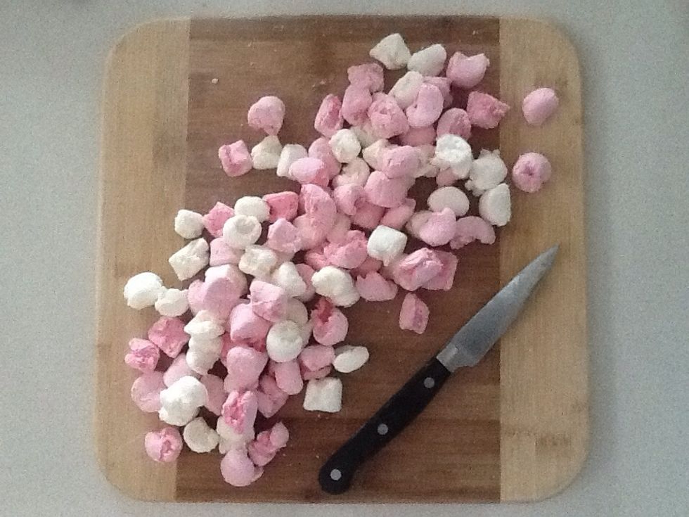 Cut the marshmallows in half