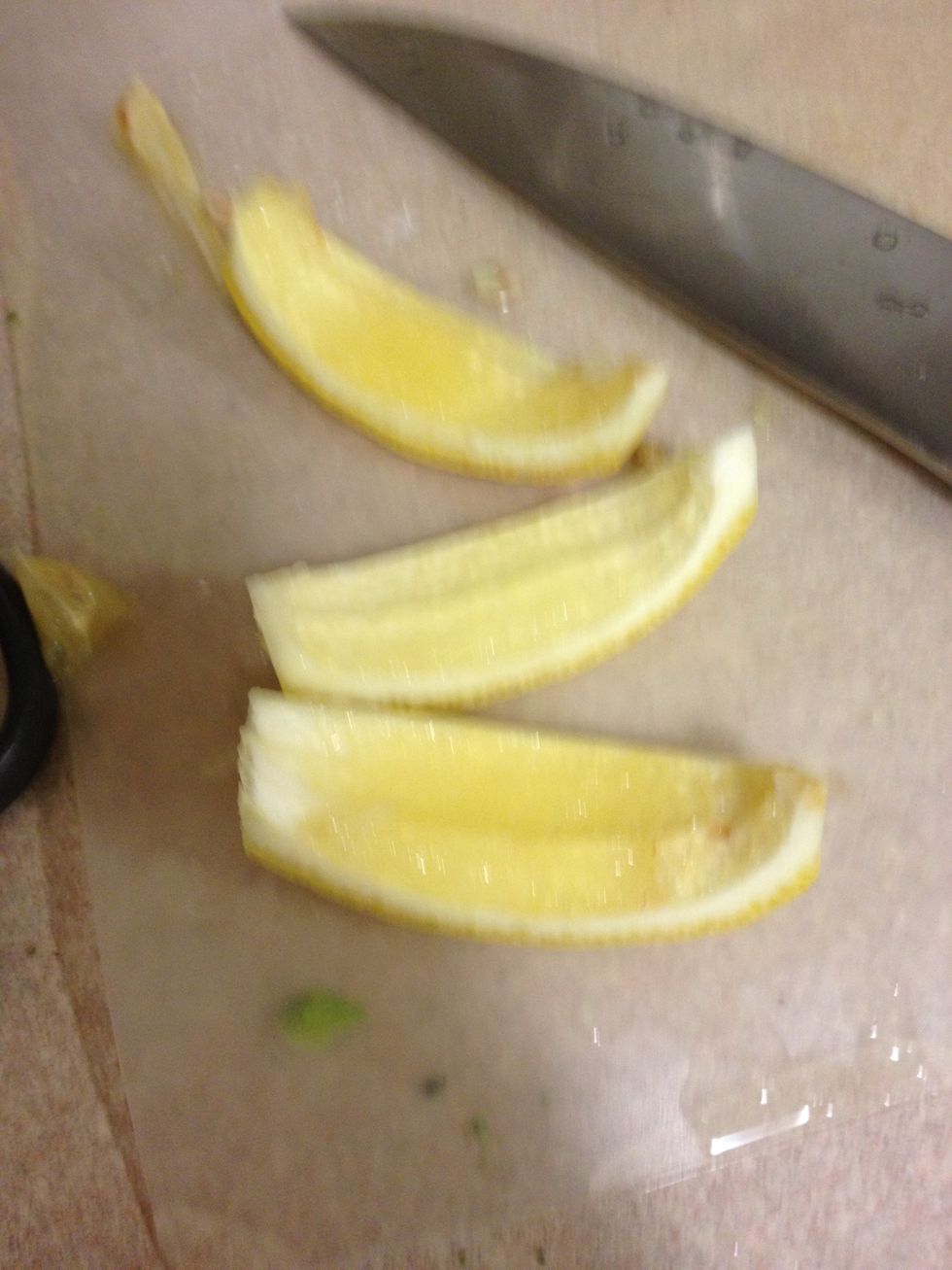 Cut the Middle out of one lemon and put it in the pitcher.. Don't forget the seeds