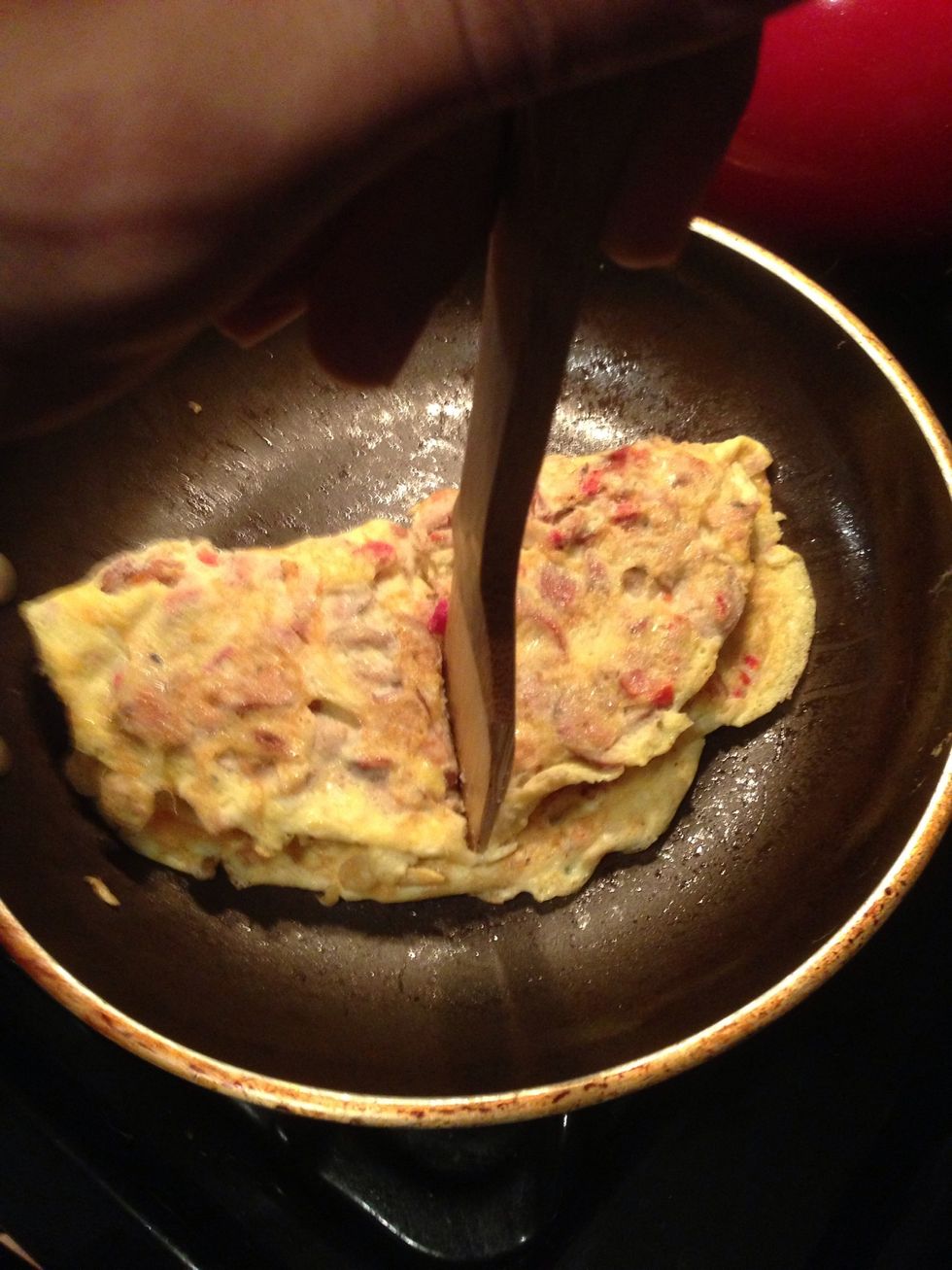 Cut the omelette In half