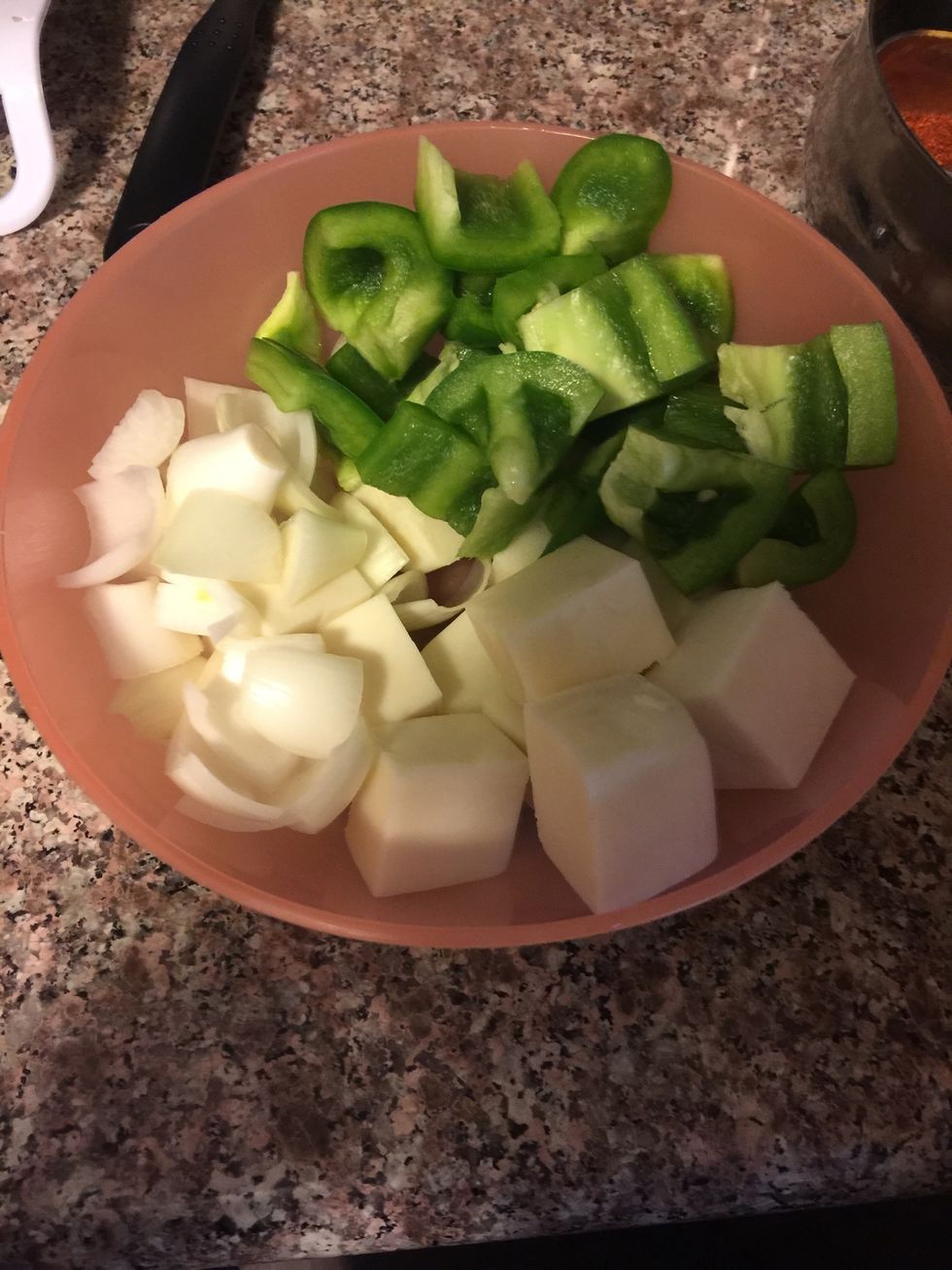 Cut the onion, capsicum and paneer into small bite size cubes. Try and cut them same size.