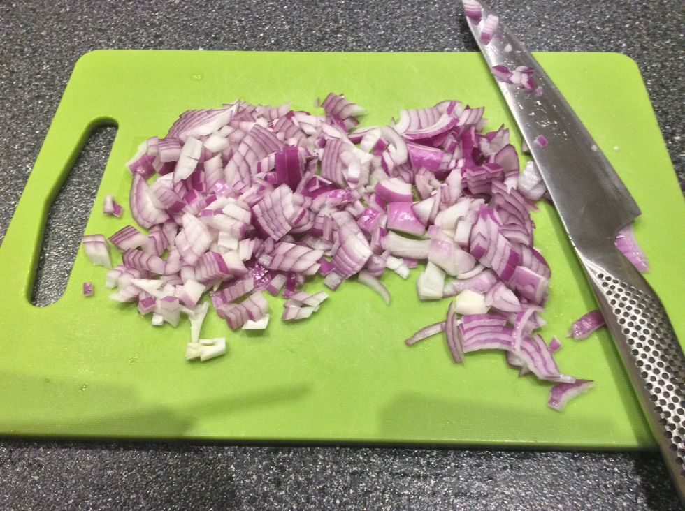 Cut the onion into tiny pieces like shown in the picture.
