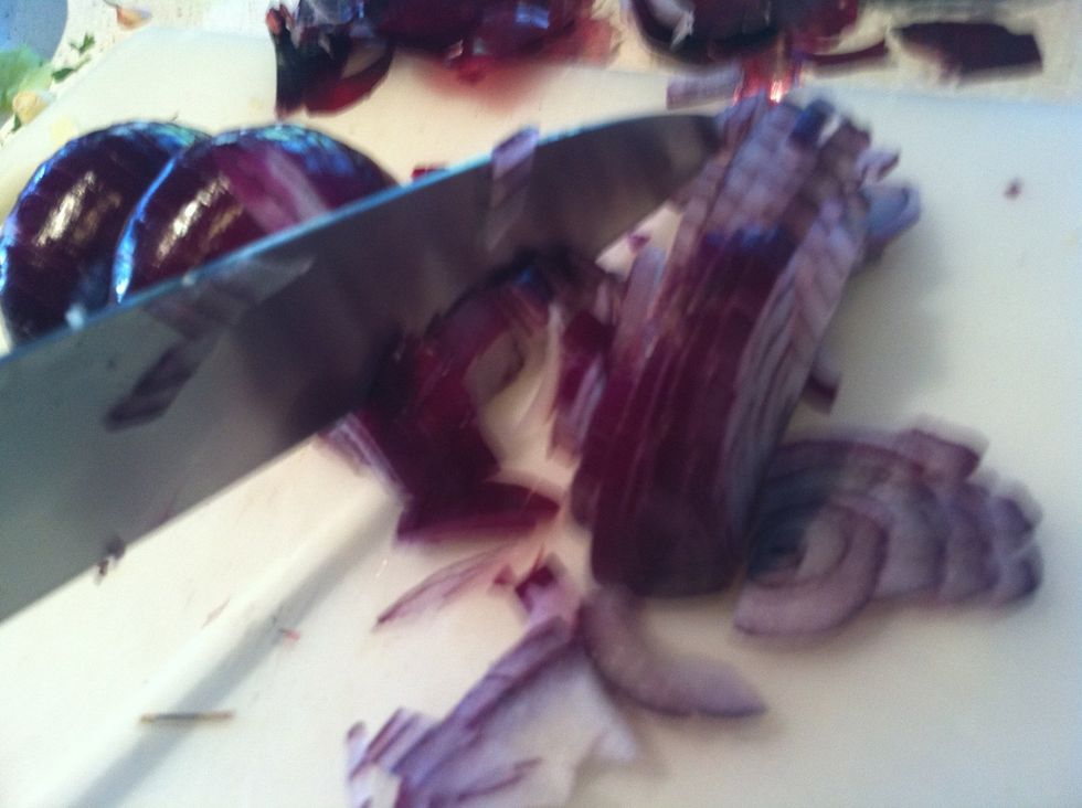 Cut the onion lengthways and then across to dice into small cubes.