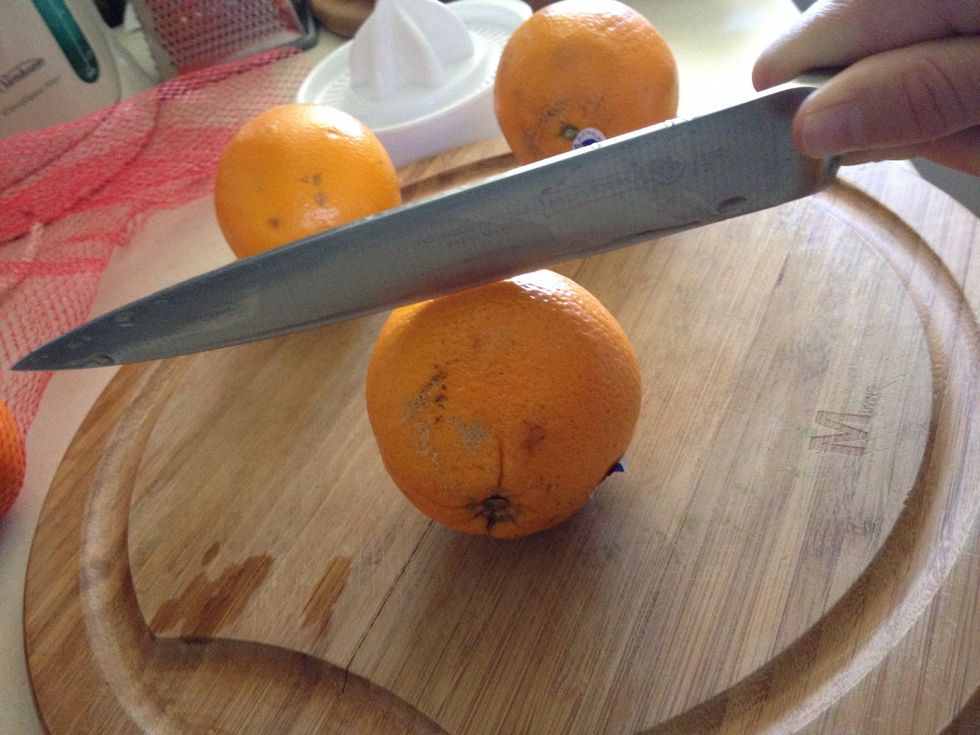 Cut the oranges in half sideways. So the top and bottom of the orange end up on opposite ends, it makes it easier to juice.