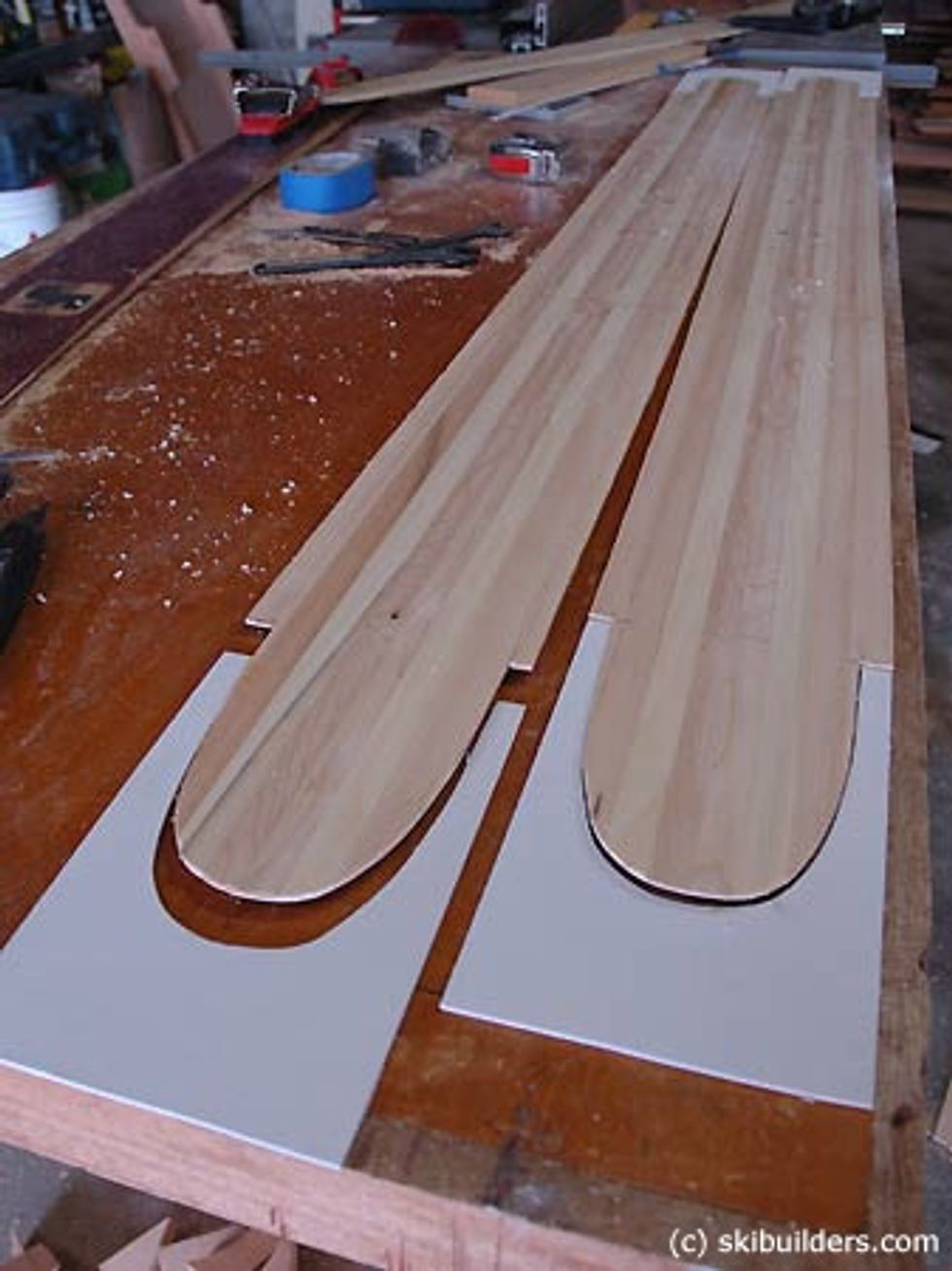 Cut the outline of the skis to create tip spacers