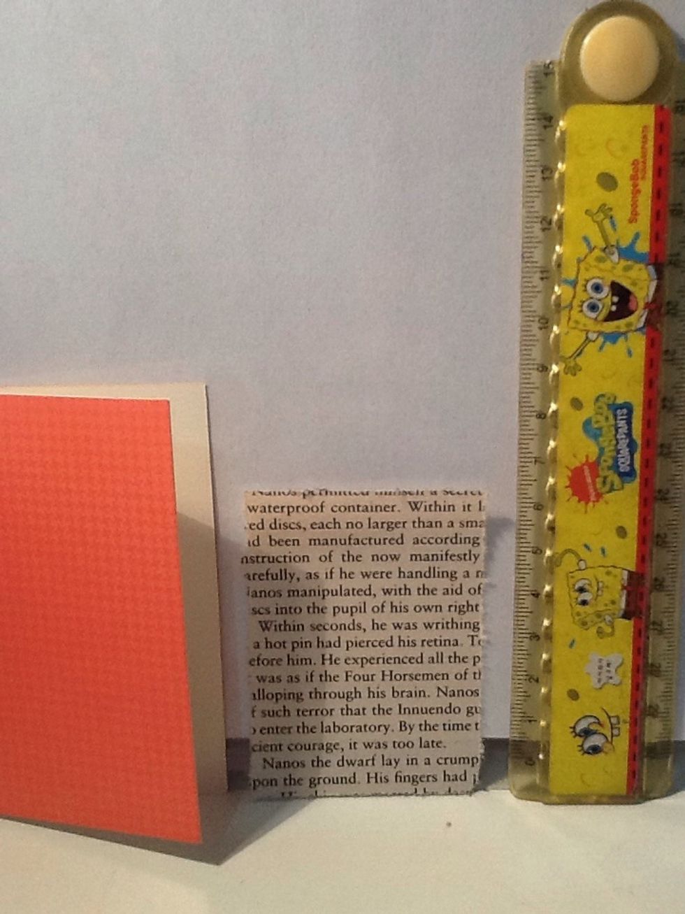 Cut the page using a ruler until the size is a bit smaller than the front of the card. Here you can see the measurements of mine.