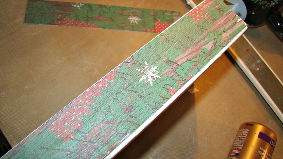 Cut the papers to fit the side, back and inside of the box, distress the edges of the paper before applying to box.