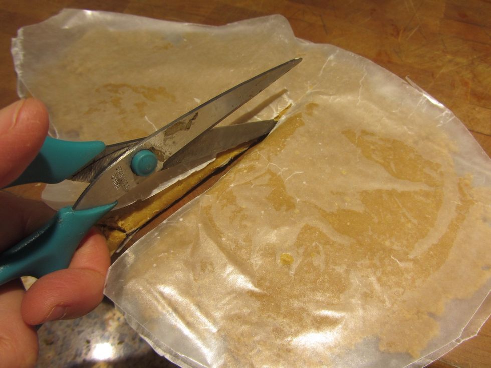 Cut the patty in half through the paper so you have two patties layered between wax paper.