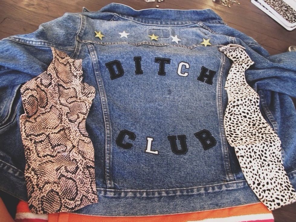 Cut the pieces to fit the back side panels and safety pin the fabric along the denim seams.