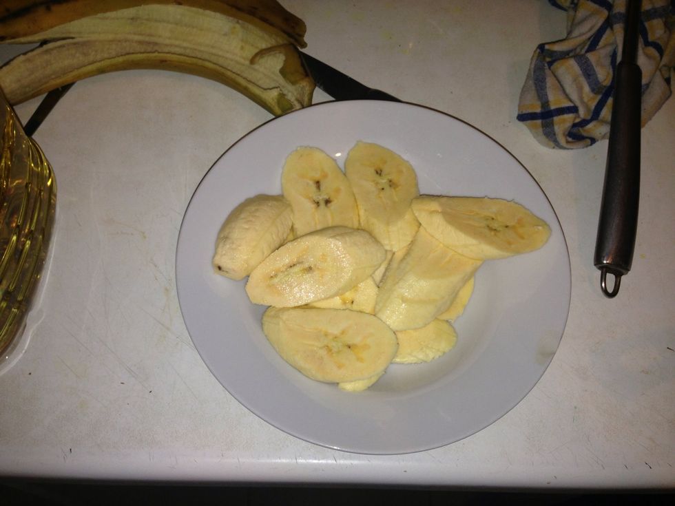 Cut the Plantain into an oval shape or round, it cooks easier! You can add Salt to taste, I prefer not to!
