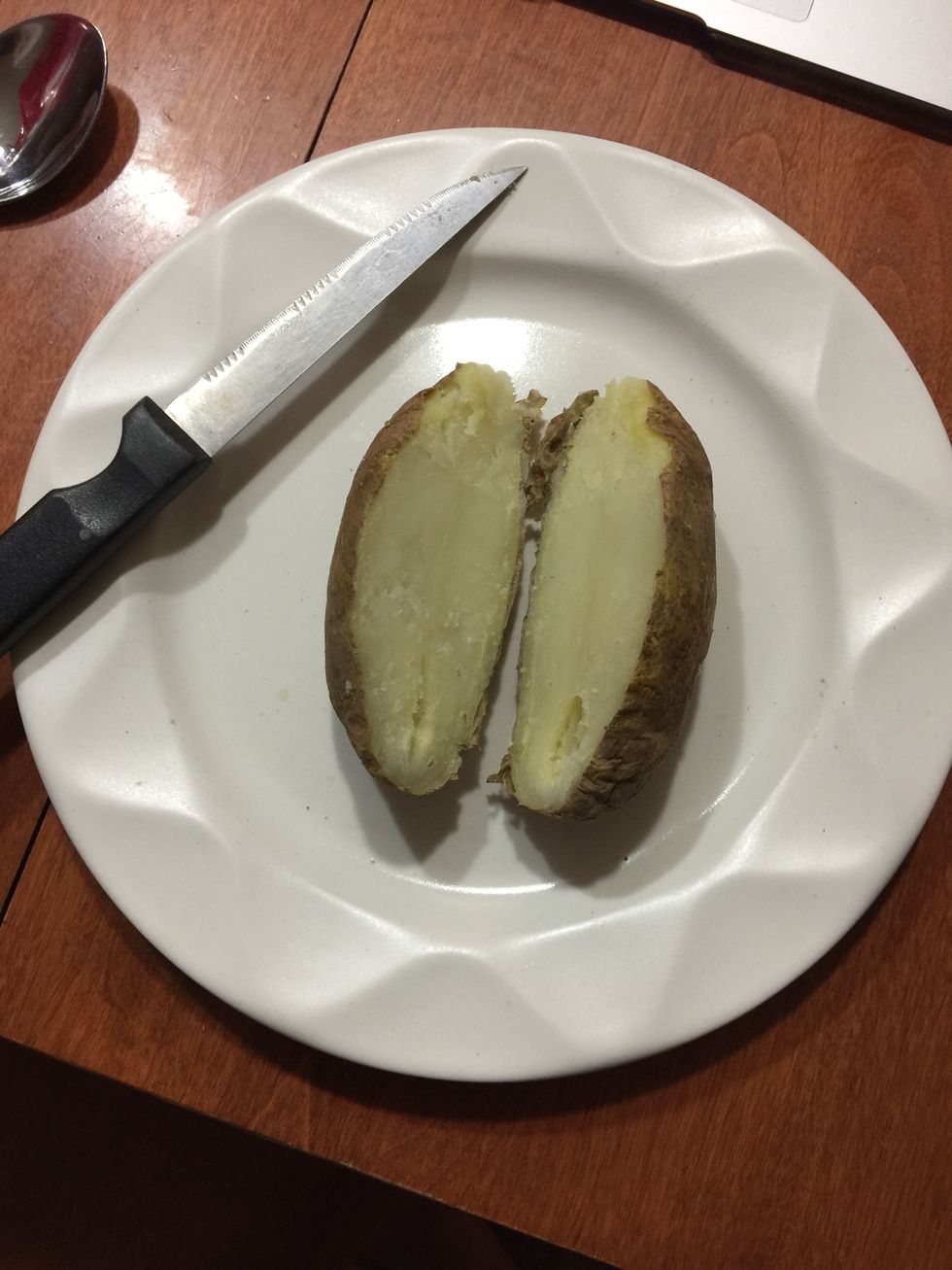 Cut the potato in half