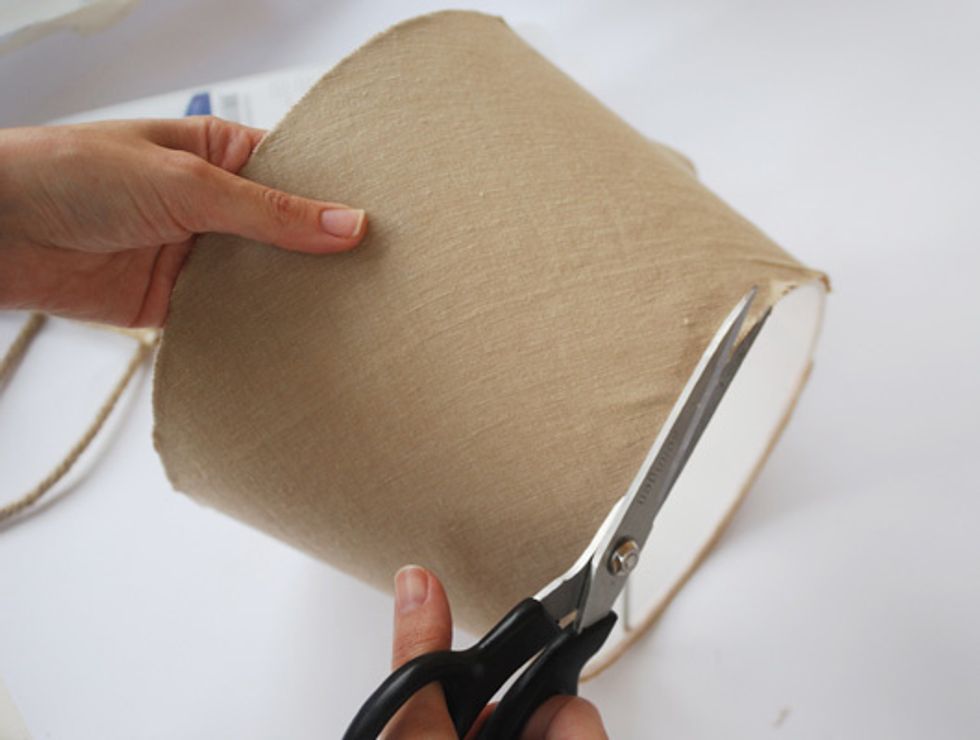 Cut the remaining fabric with scissors.