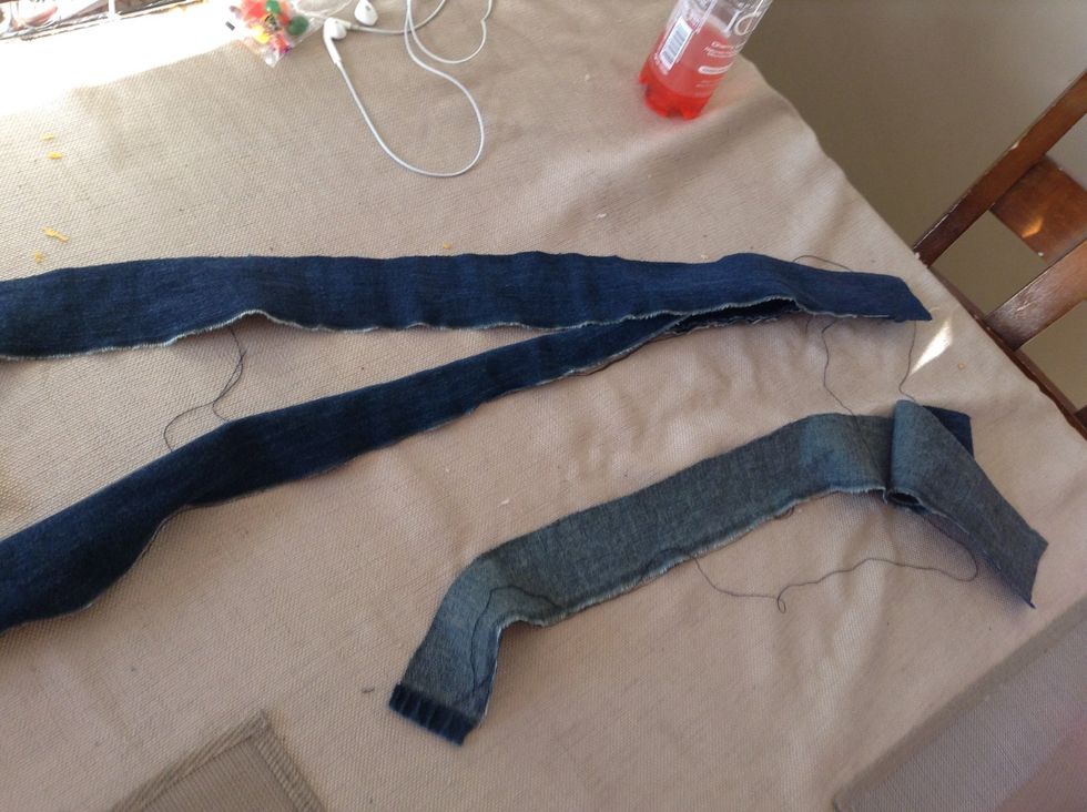 Cut the rest of the pants into 6 strips. (If you have any threads, cut them off.)