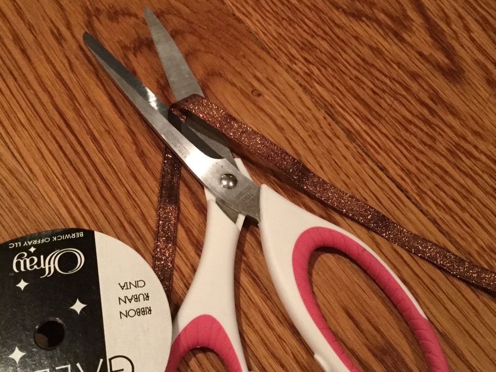 Cut the ribbon you're using to string together the bags.