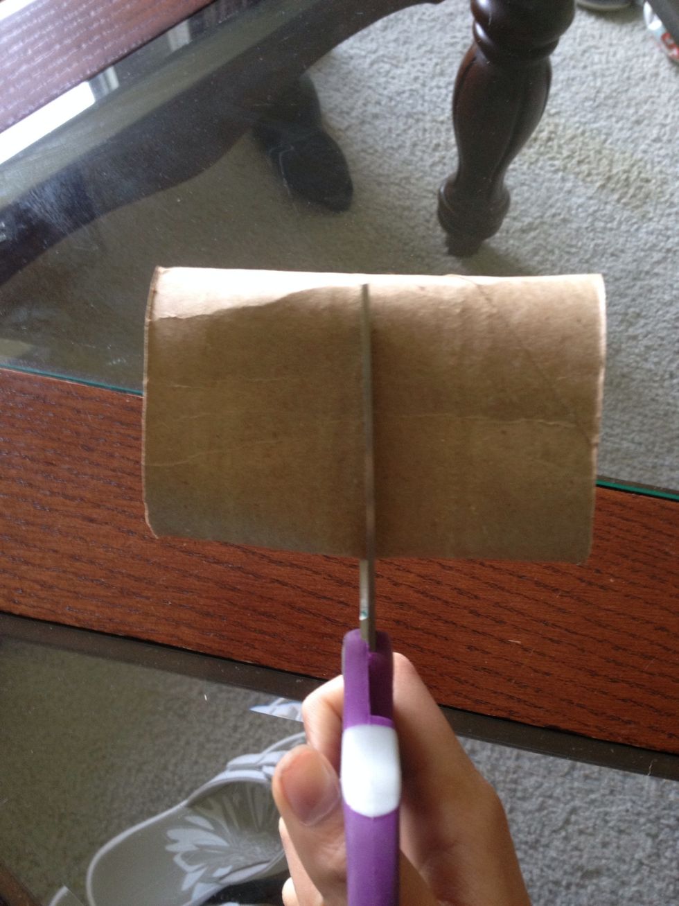 Cut the roll in half as evenly as possible, it doesn't have to be perfect.