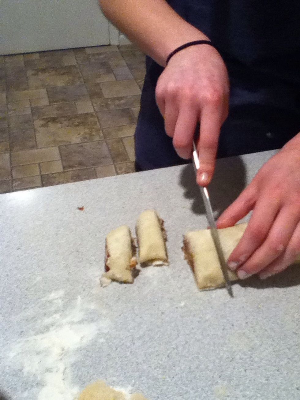 Cut the rolled dough into smaller pieces.