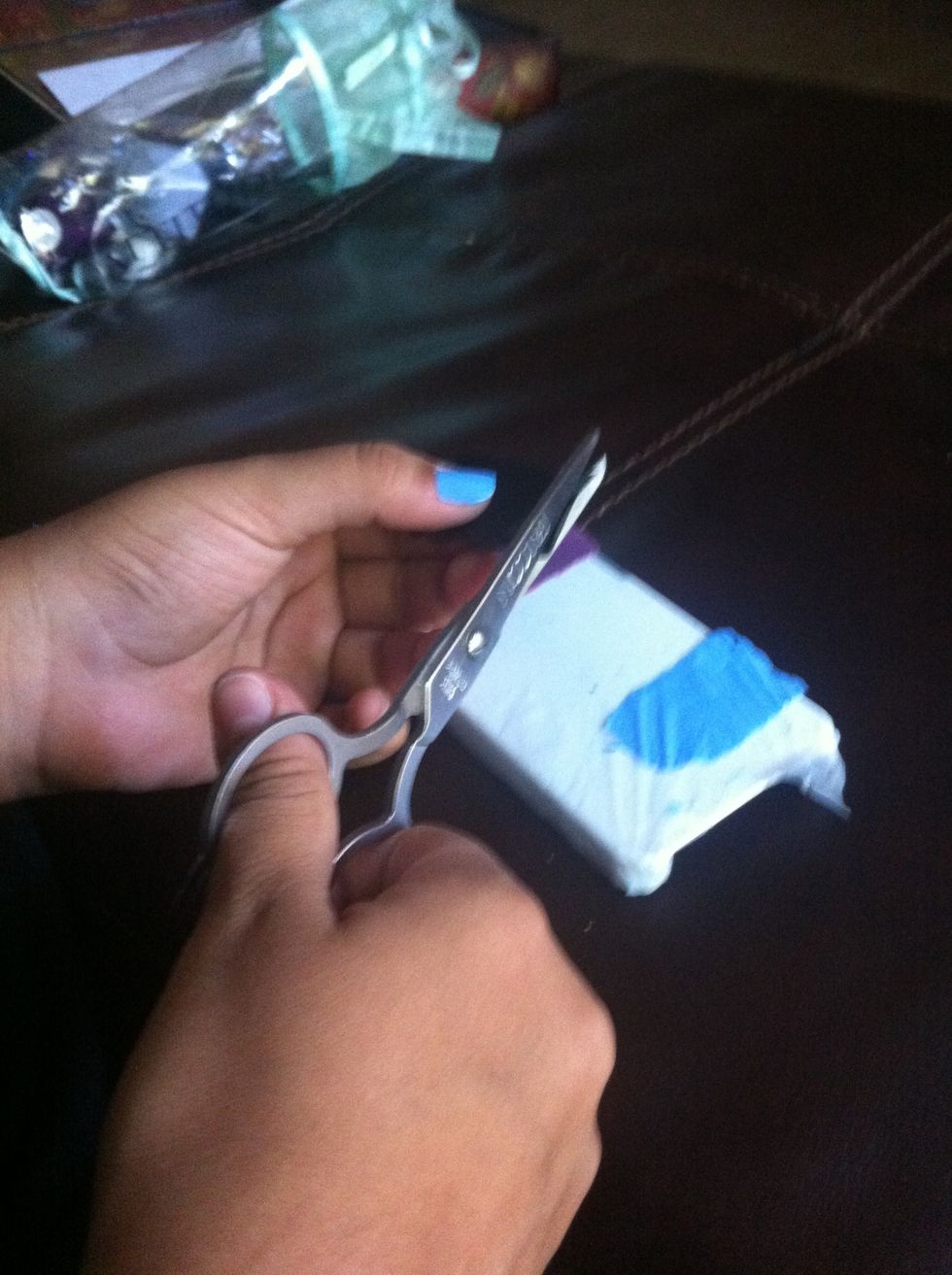 Cut the rough edges off, so you have three, clean cut, rectangles(: