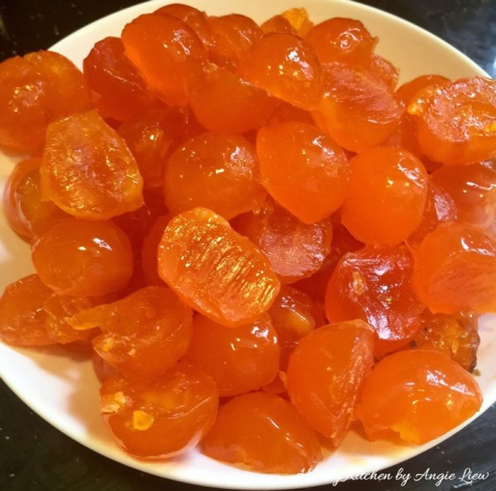 Cut the salted egg yolks in halves.