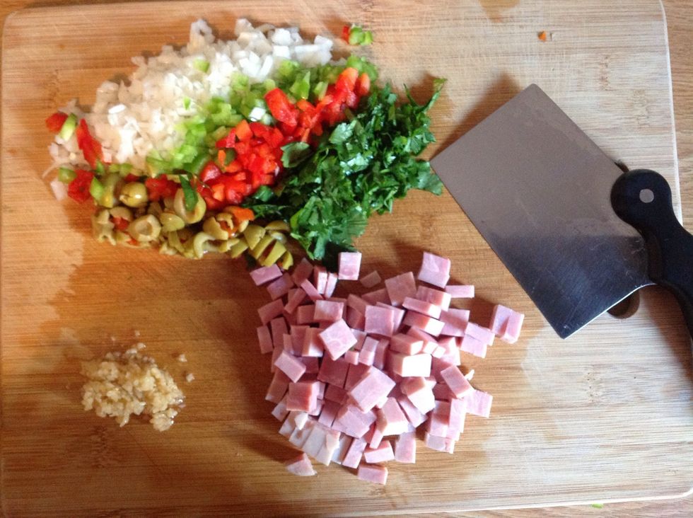 Cut the same ingredients for the sofrito. ( sofrito is the basis of the majority of PR dishes, it is the flavoring of the dish withall the veggies and spices)