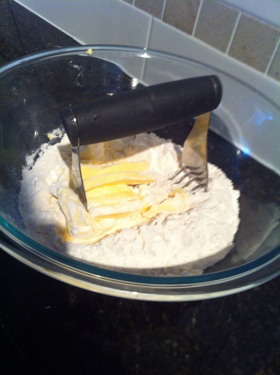 'Cut' the shortening into the flour until it looks like...