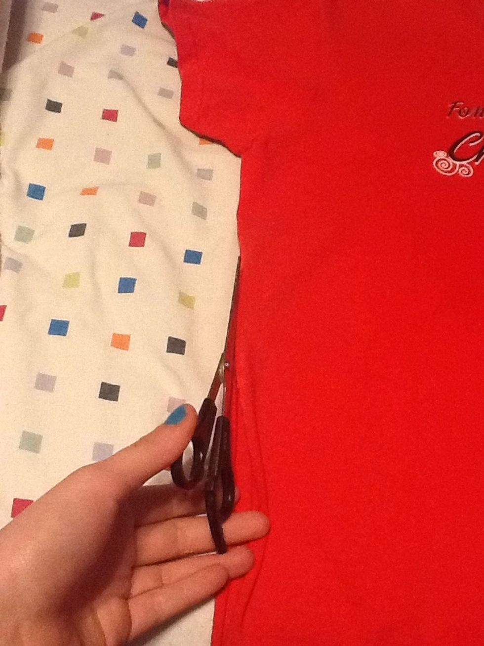 Cut the side starting from the bottom going all the way up to the armpit area.