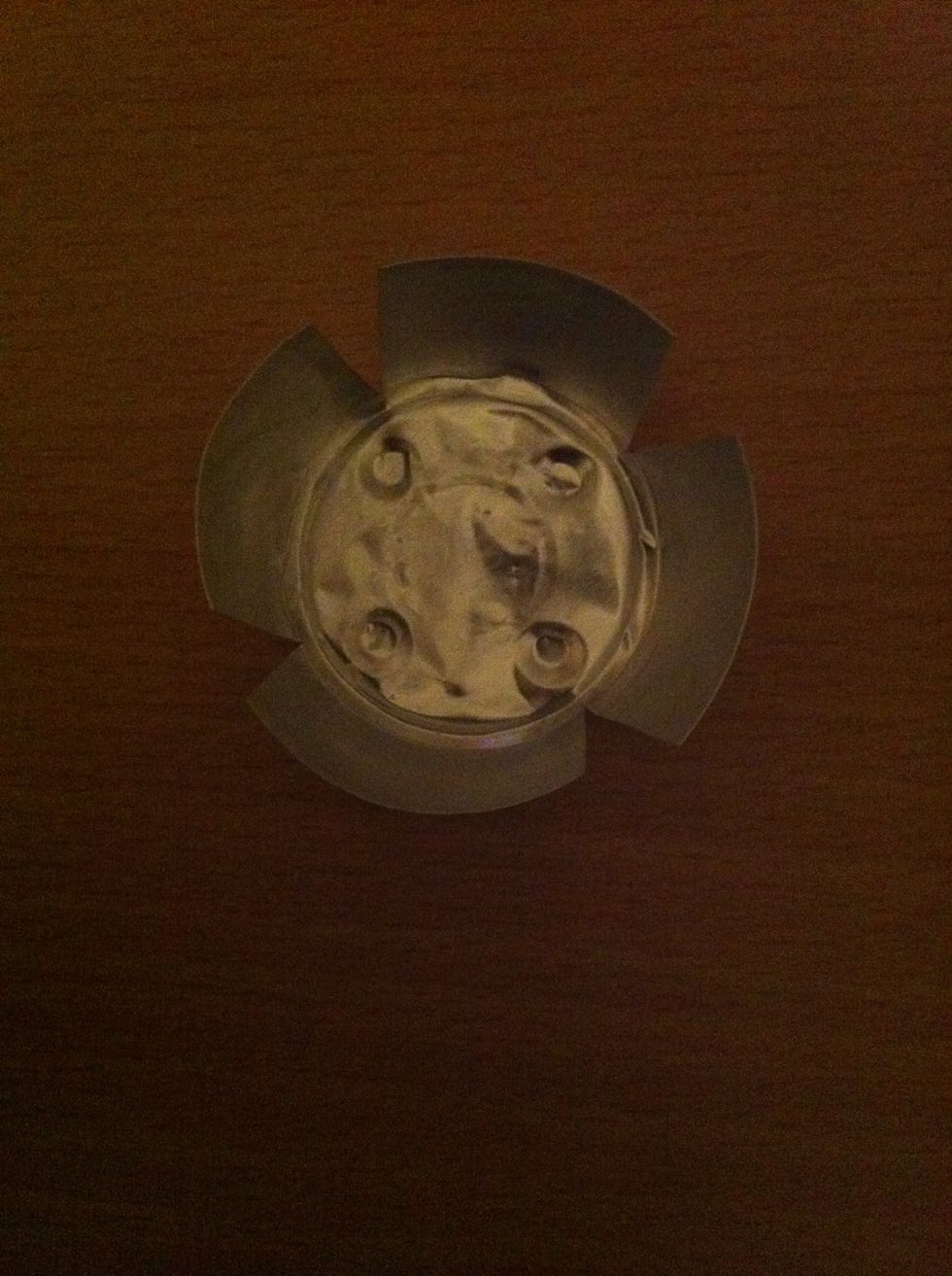 Cut the sides four times like in the picture. It will make the sides the same seize.