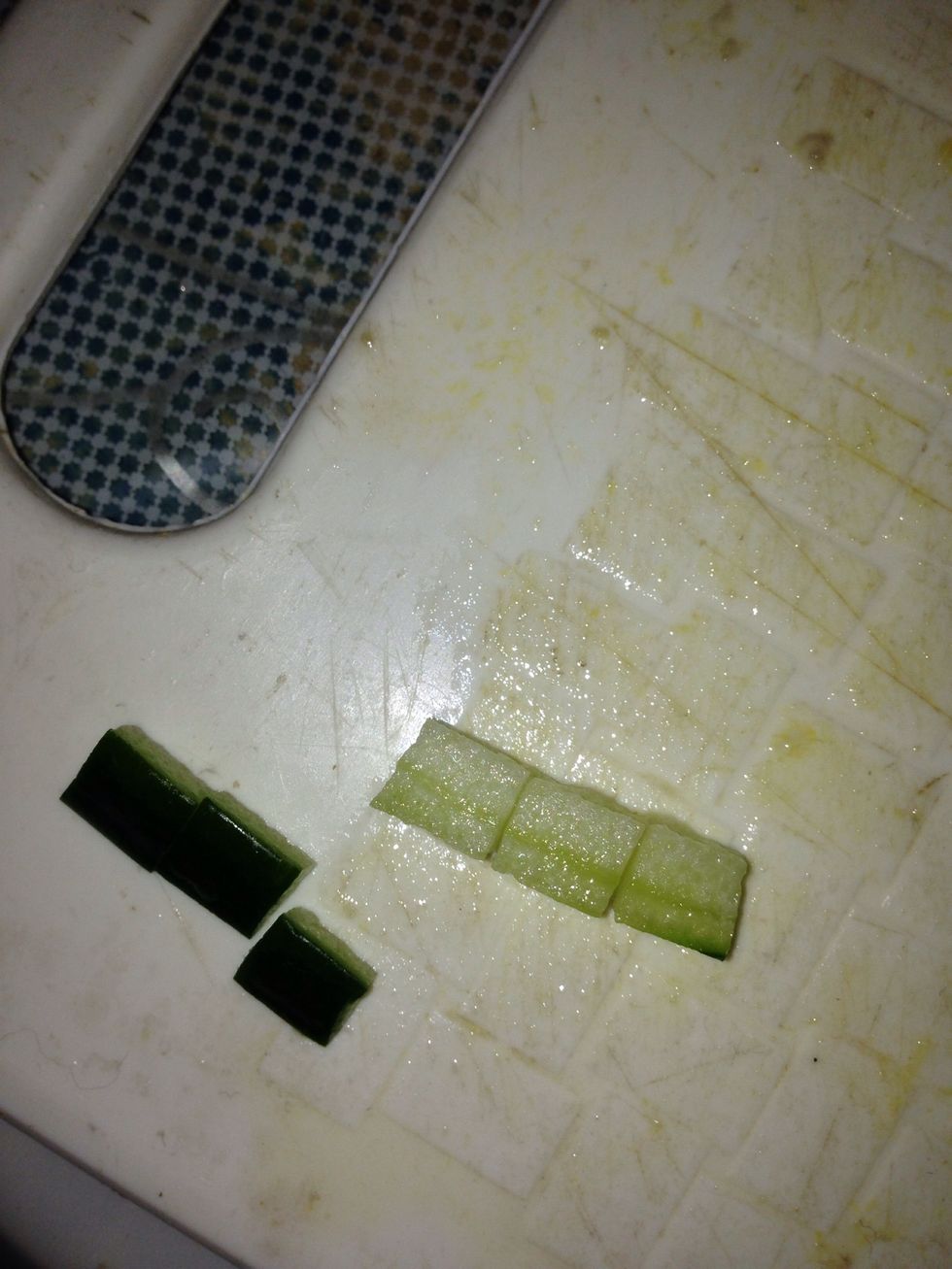 Cut the skin to make the button on the rabbit's body. And use the flesh for the teeth.