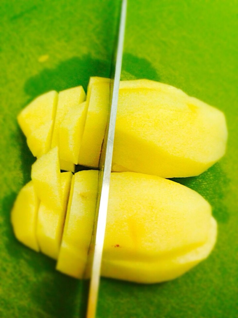 Cut the slices diagonally not too thick or too thin. If you cut too thick the potato will not cook through. If you cut too thin it will cook too quickly and turn into mushed potato while stirring