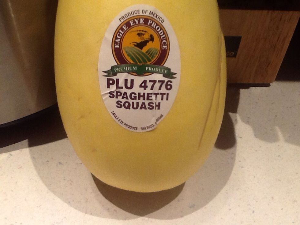 Cut the squash in half.