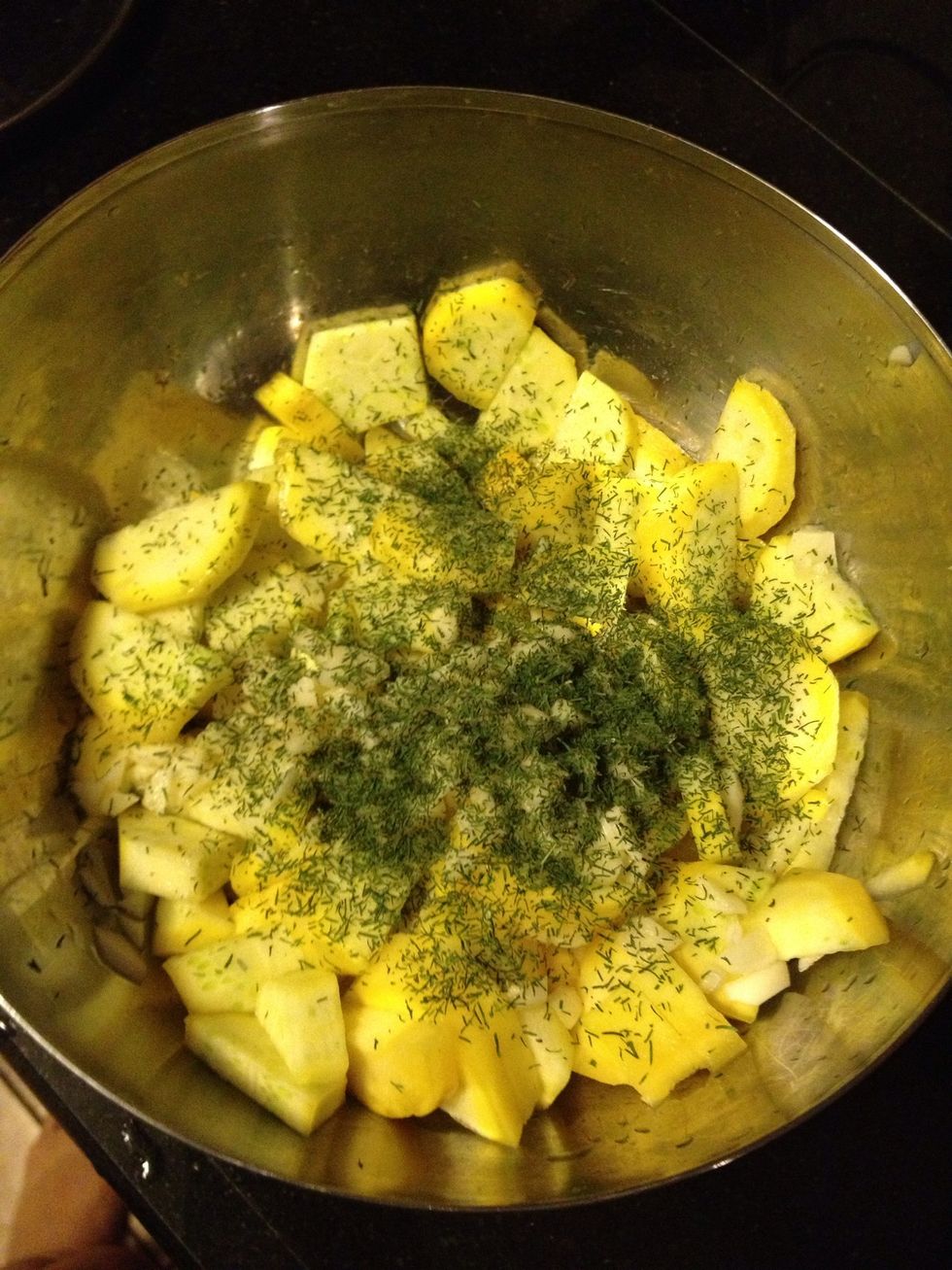 Cut the squash into 1/4 inch slices. Saut\u00e9ed the garlic and drill/thyme for a few seconds to flavor the oil, Then anded the squash and cooked it about 4 minutes.