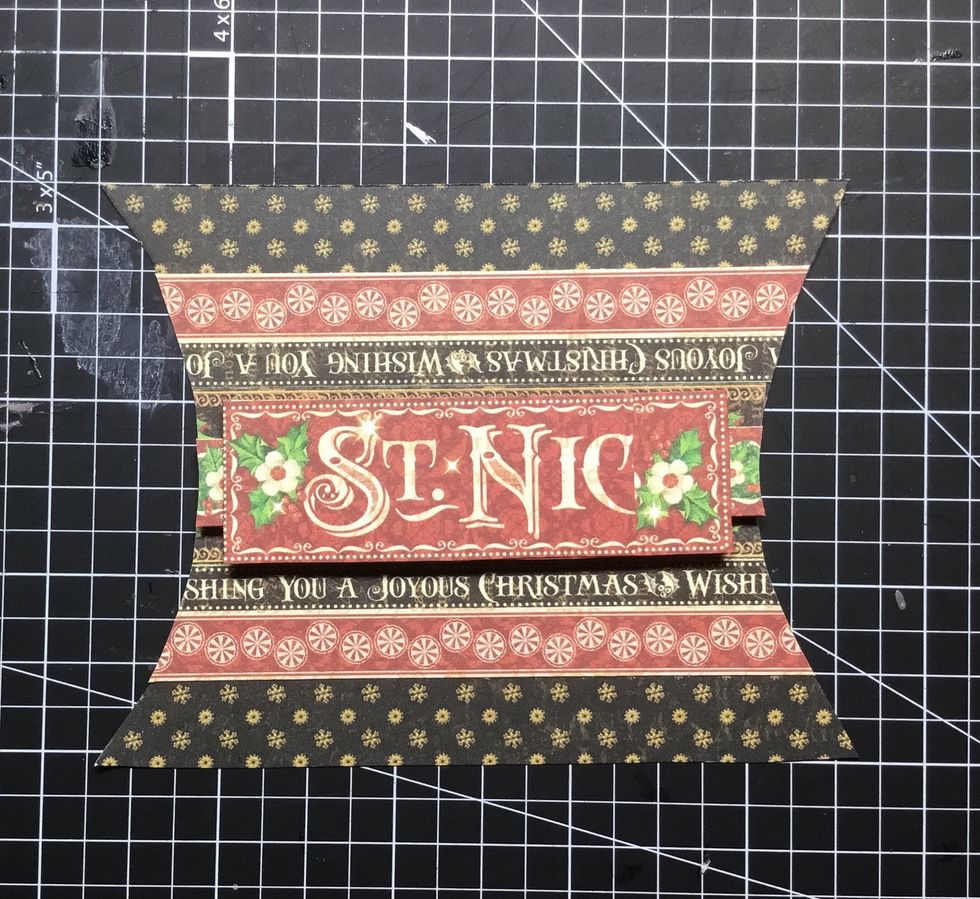 Cut the St Nicholas paper piece in half and then layer and attach as shown.