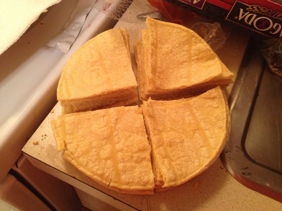 Cut the stack of tortillas in quarters like so.
