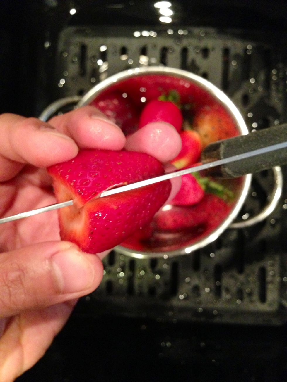 Cut the Strawberry in half.