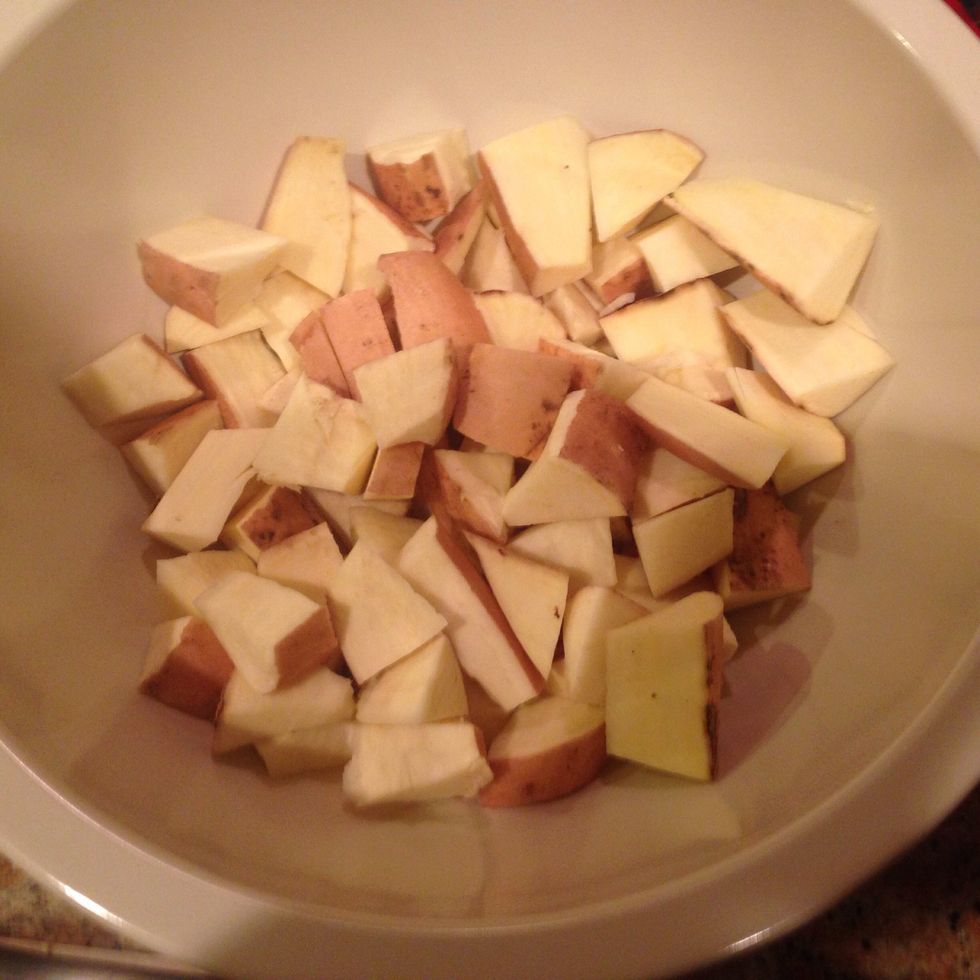 Cut the sweet potatoes into wedges, no thicker than 1 1/2 inches. Place in a medium size bowl. Drizzle basil mixture over the sweet potatoes. Toss gently.