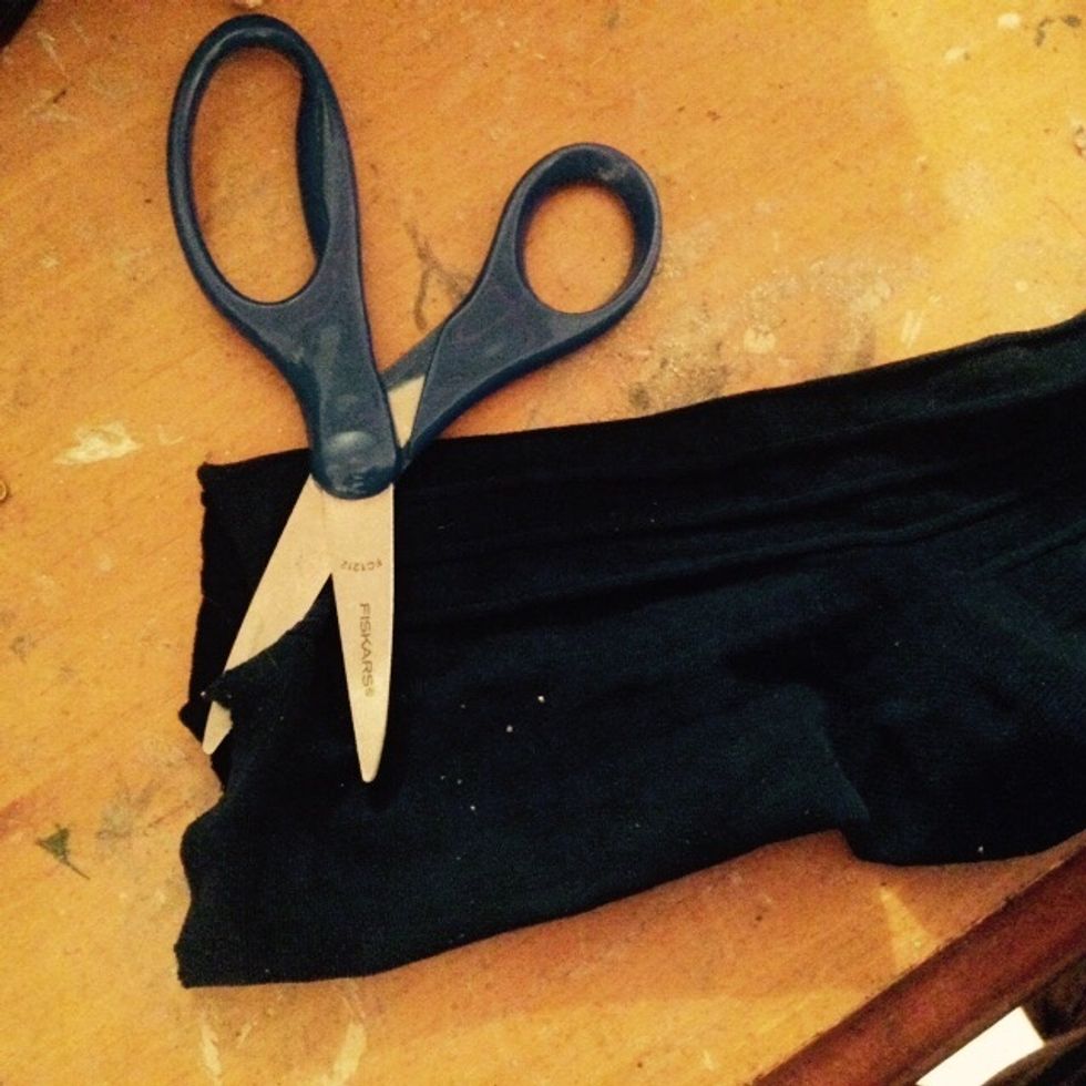 Cut the toe of your sock off