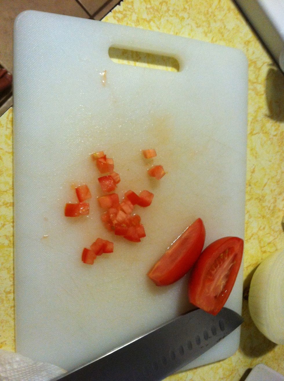 Cut the tomatoes in little cubes. You want all of your ingredients to be about the same size.
