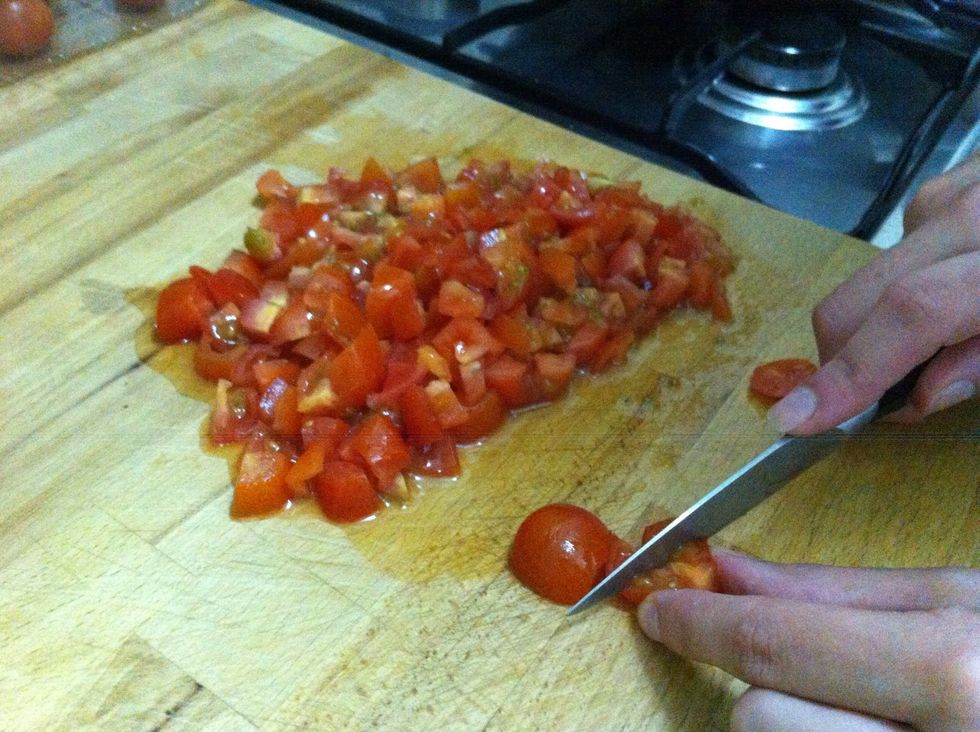 Cut the tomatoes into small pieces and reserve