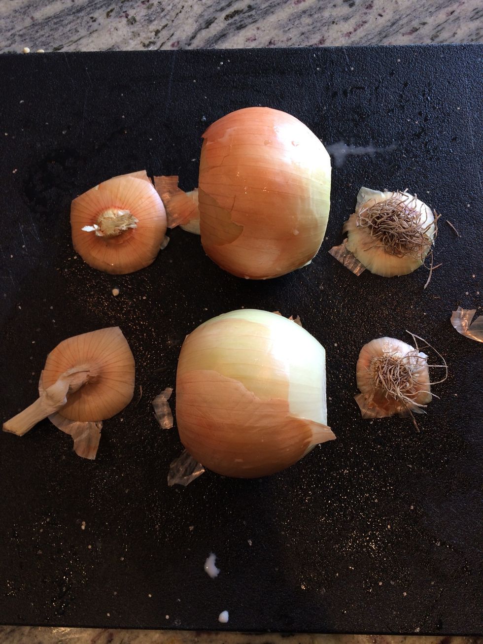 Cut the top and bottom of the onions