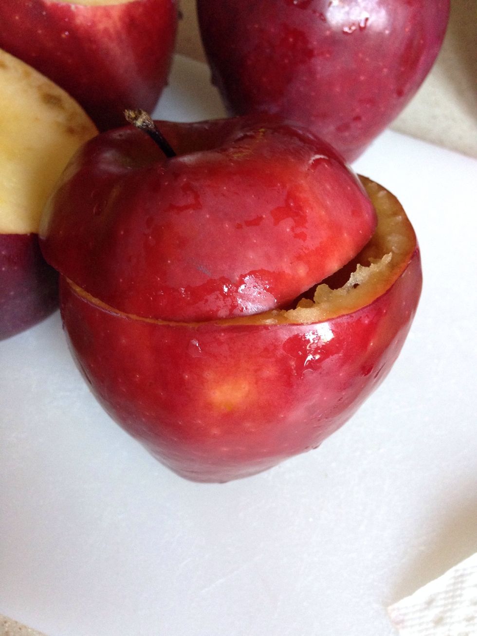 Cut the top of the apple just like so.