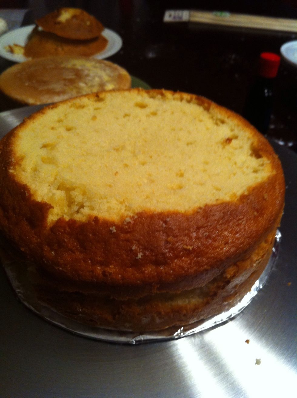 Cut the top of the cake to make sure it's leveled. I did not have a Serrated knife, like most people suggest, so I used the longest knife in my kitchen.