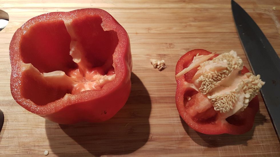 Cut the top off the capsicum and discard both the top and the seeds.