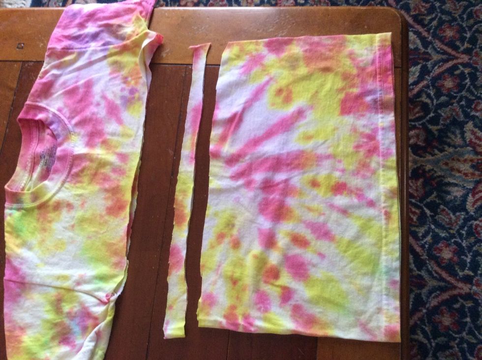 Cut the tube of fabric into one-inch strips. Repeat until you have made it through the whole tube.