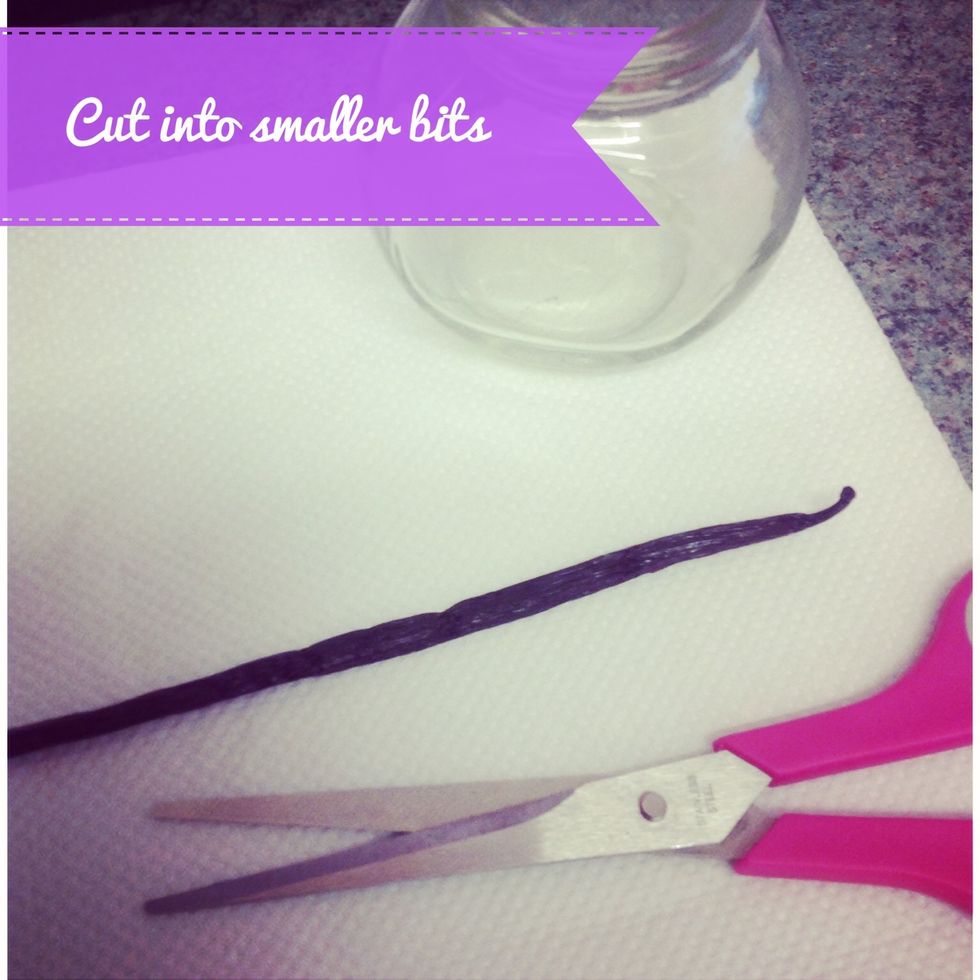 Cut the vanilla pod into smaller bits and layer onto the sugar.
