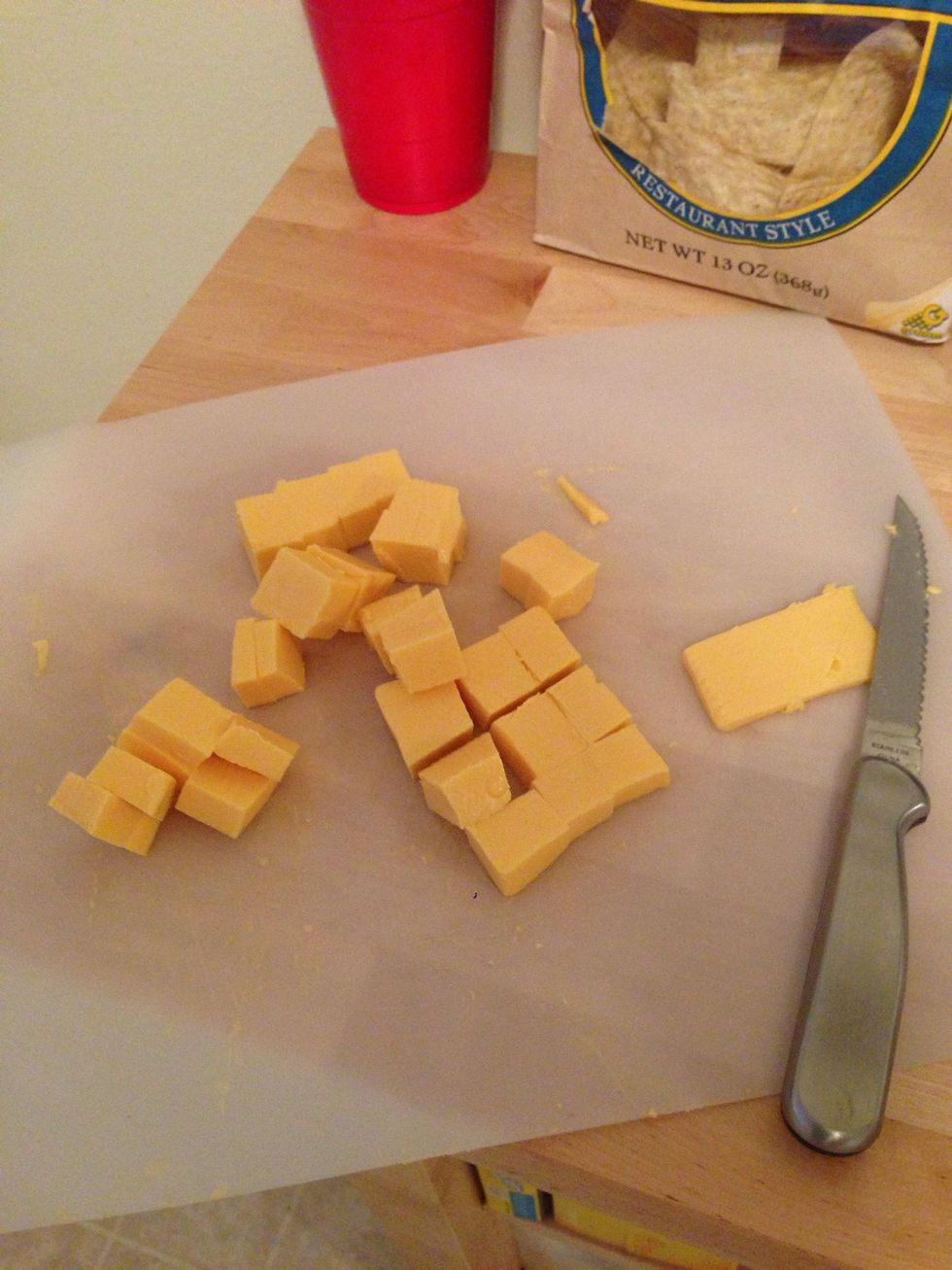Cut the velveeta cheese in squares. If you cut them small, they will melt faster.