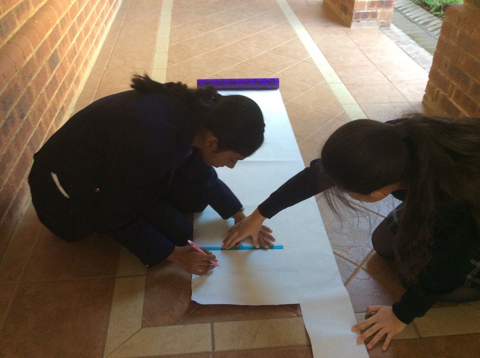 Cut the wallpaper to the size of your locker