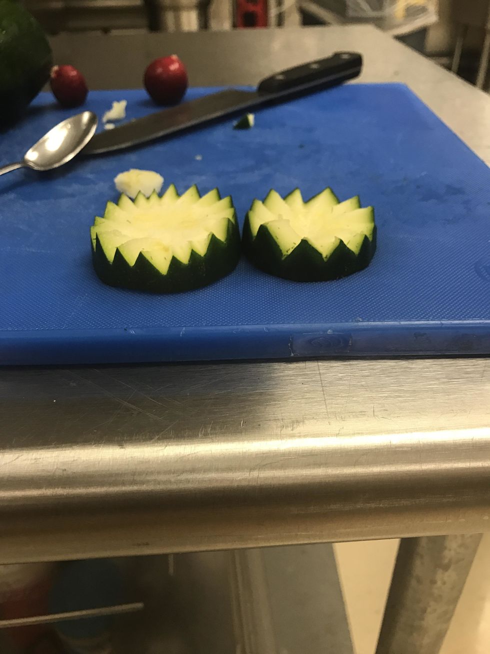 cut the zucchini evenly throughout and peel away the discarded pieces.