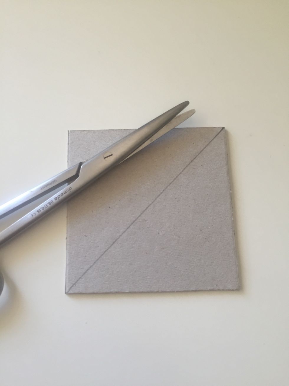 Cut them as shown...Repeat the process with the other square.