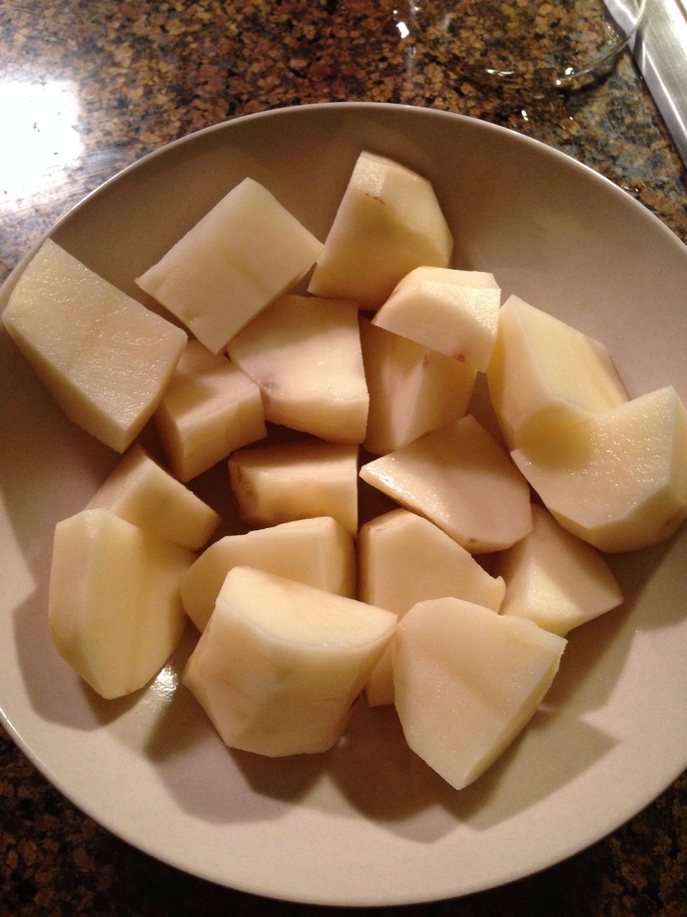 Cut them into equal cubes and give them a rinse to wash off some excess starch!