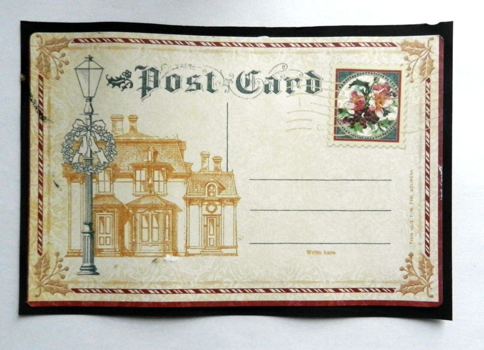 Cut this post card from G45 Christmas Carol collection and glue it on a piece of cardstock measuring 2/8"longer than the postcard on each side.